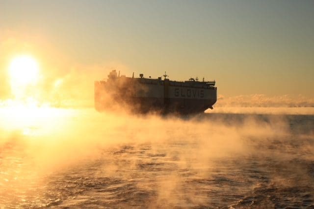 Pilot Stations & Boarding Ship in foggy sunrise